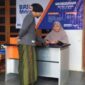 Agen mitra UMi BRILink, Hj. Caryati. (Dok. BRI)