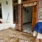 Tim Gabungan bersama warga lakukan pembersihan material pascabanjir di Kabupaten Jayapura, Provinsi Papua. (Dok. BPBD Kabupaten Jayapura.)
